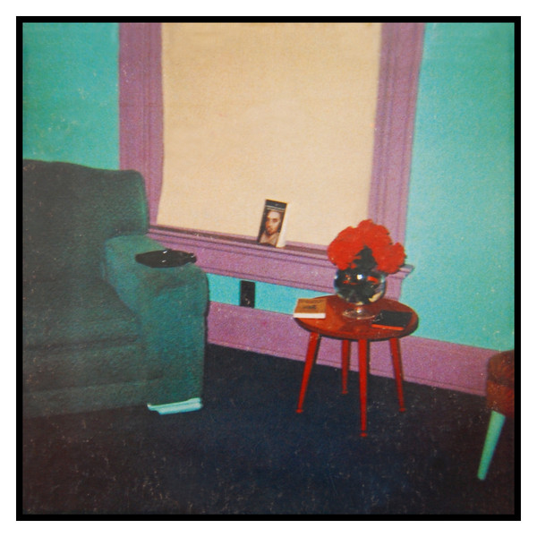 The cover of Jandek's first album 'Ready for the House,' depicting a photograph of a living room.