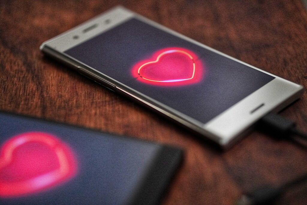 An image of a phone with a dating app, similar to the one used by Jaqueline Ades, open.