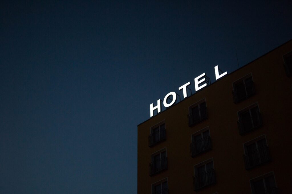 An image of a (maybe) haunted hotel with all its lights turned off.